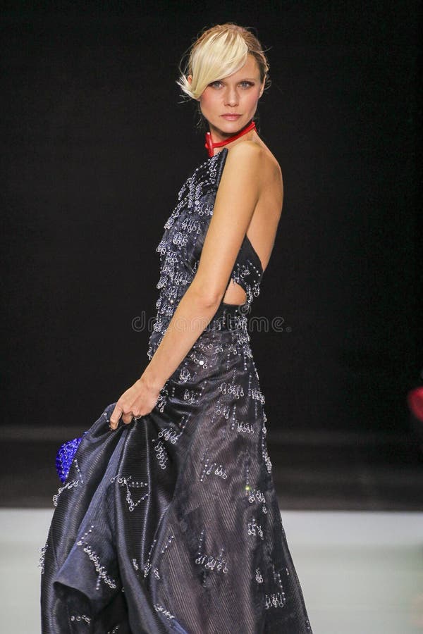 A Model Walks the Runway during the Giorgio Armani Fashion Show ...