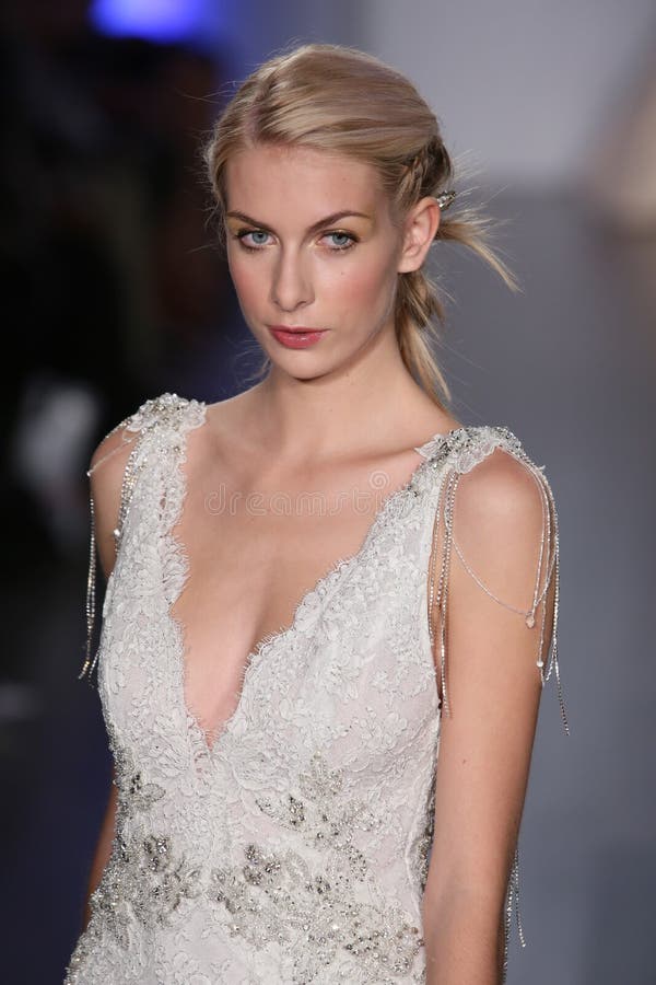 A model walks runway at Lazaro fashion show during Fall 2015 Bridal Collection