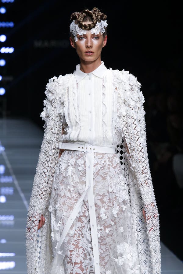 A Model Walks the Runway during the Mario Dice Fashion Show Editorial ...