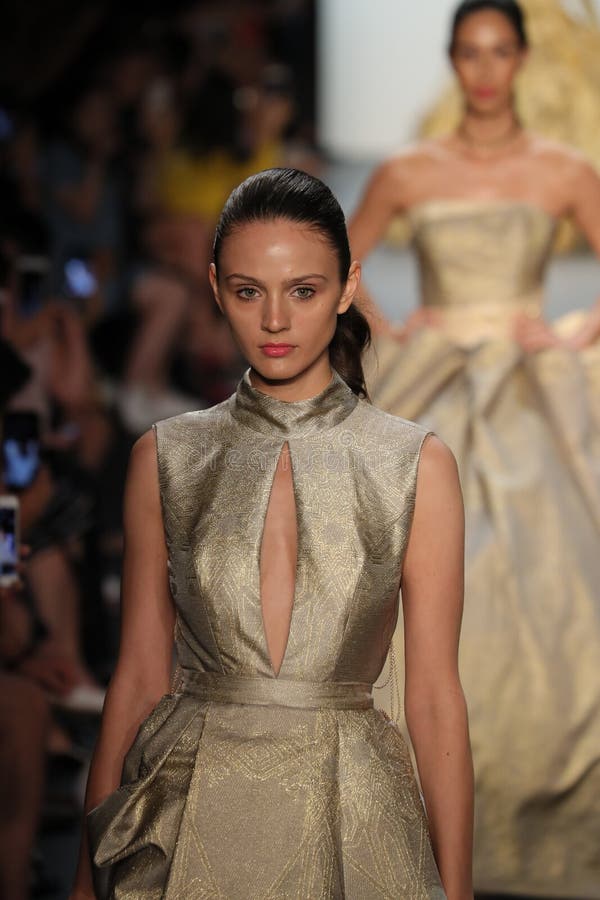 A Model Walks The Runway At The Vicky Zhang Parent Child Collection S/S ...