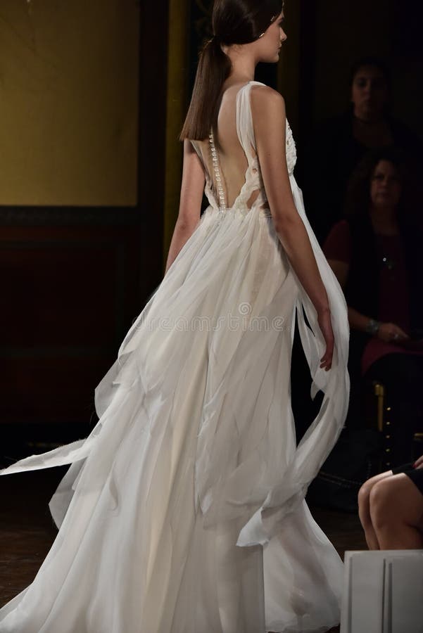 A Model Walks the Runway at the YolanCris Fall 2017 Bridal Collection ...