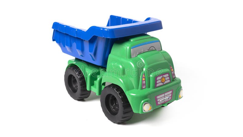 Model of toy dumper truck isolated on white. High quality photo. Model of toy dumper truck isolated on white. High quality photo