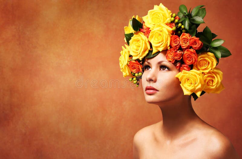 Model Girl with Flowers Hair. Hairstyle. Fashion Beauty Woman with Yellow Roses. Model Girl with Flowers Hair. Hairstyle. Fashion Beauty Woman with Yellow Roses