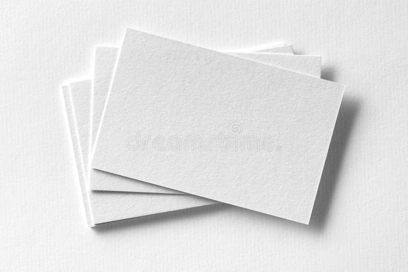 Modellen av affärskort fläktar bunten på vit texturerat papper royaltyfri fotografi