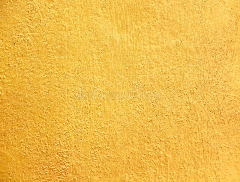 Modelli approssimativi di vecchia struttura dell'estratto del muro di cemento dell'oro per fondo immagine stock libera da diritti Modelli approssimativi di vecchia struttura dell'estratto del muro di cemento dell'oro per fondo immagine stock libera da diritti