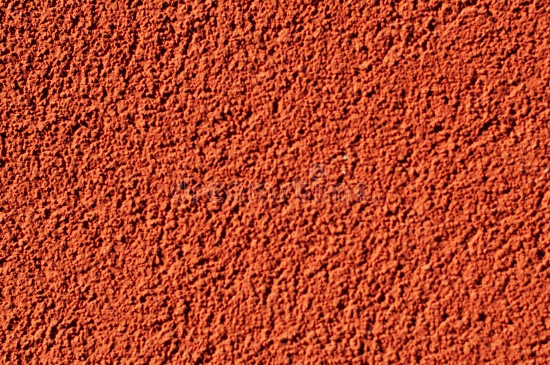 Modello arancio della parete dello stucco per fondo Il muro di cemento mostra la struttura di cemento fotografie stock Modello arancio della parete dello stucco per fondo Il muro di cemento mostra la struttura di cemento fotografie stock