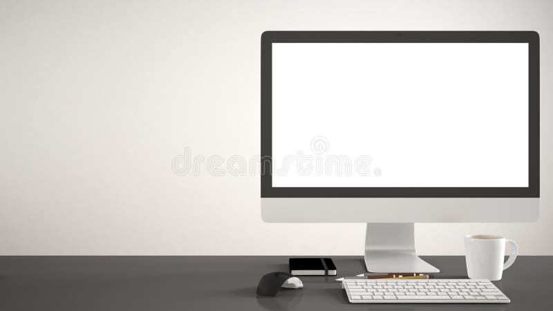 Modello da tavolino, modello, computer sullo scrittorio grigio del lavoro con lo schermo in bianco, topo della tastiera e blocco