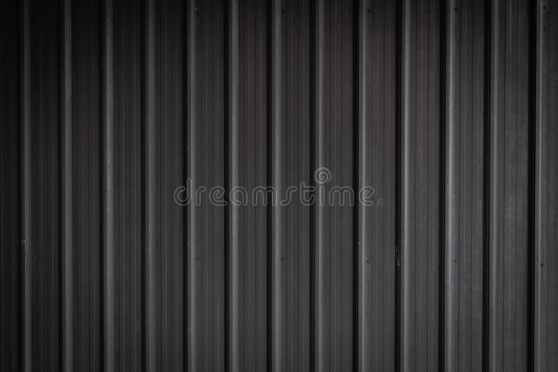 Modello e fondo neri della lamina di metallo fotografie stock libere da diritti Modello e fondo neri della lamina di metallo fotografie stock libere da diritti