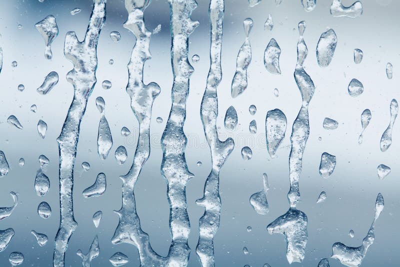 Modello ghiacciato congelato dell'acqua sulla superficie della finestra di vetro fondo strutturato del macro ghiaccio di vista Co fotografia stock libera da diritti Modello ghiacciato congelato dell'acqua sulla superficie della finestra di vetro fondo strutturato del macro ghiaccio di vista Co fotografia stock libera da diritti