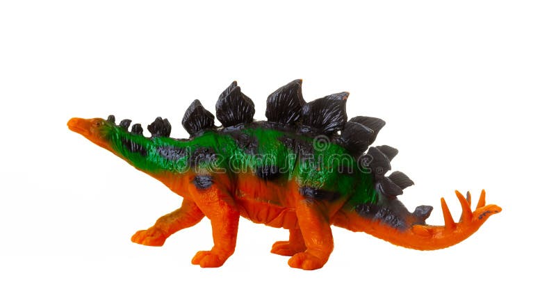 Modello plastico realistico di uno stegosauro dinosauro su fondo bianco immagine stock