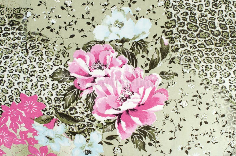 Modelo floral y del guepardo en tela libre illustration Modelo floral y del guepardo en tela libre illustration