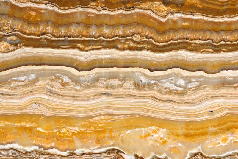 Modelo natural real del fondo de la textura del oro del imperio de Onice del ÓNIX
