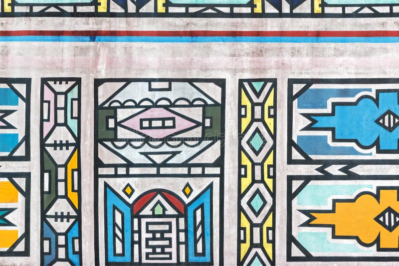 Modelos tradicionales de Ndebele del africano en la pared foto de archivo Modelos tradicionales de Ndebele del africano en la pared foto de archivo