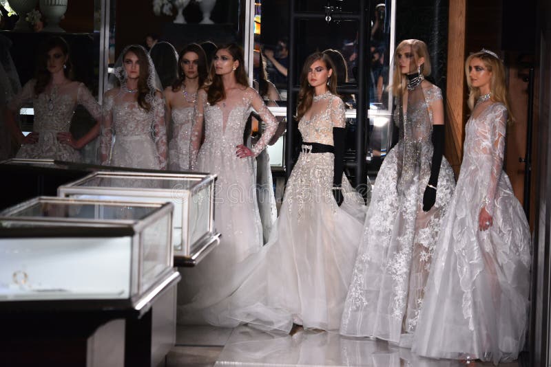 Models Pose on the Runway Wearing Reem Acra at Tiffany and Co ...
