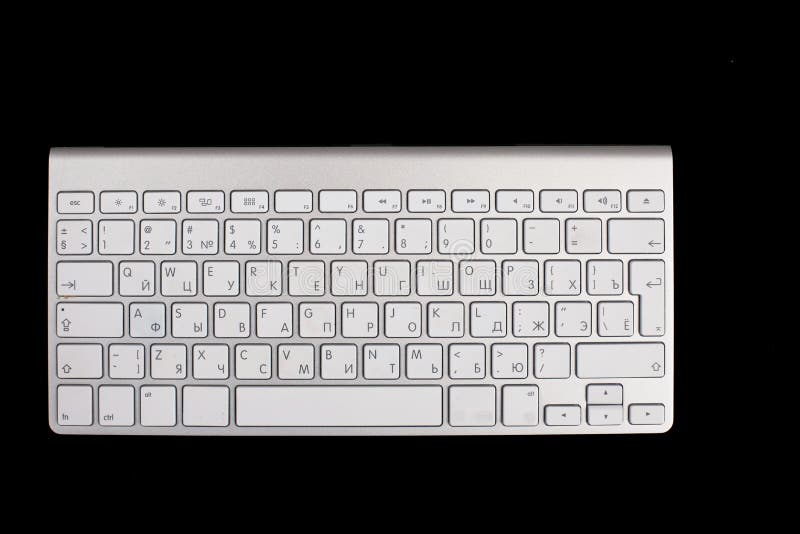 Modern Aluminum Keyboard Top View Isolated on a Black Background Stock
