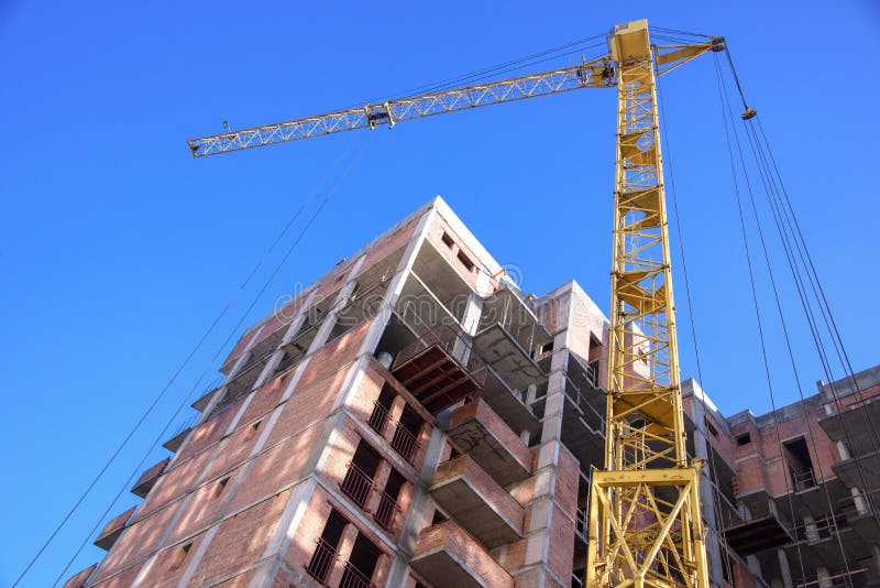 Apartment building on blue sky background