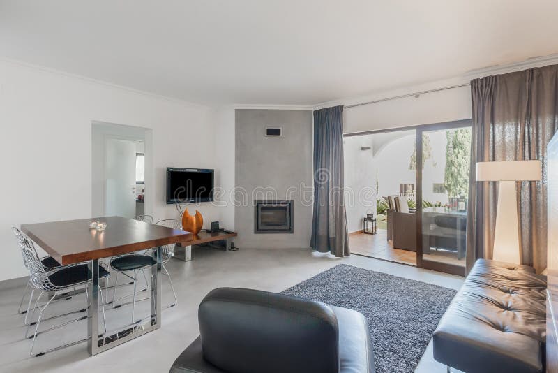 Modern Apartment with White Walls and Light Grey Floor Stock Photo