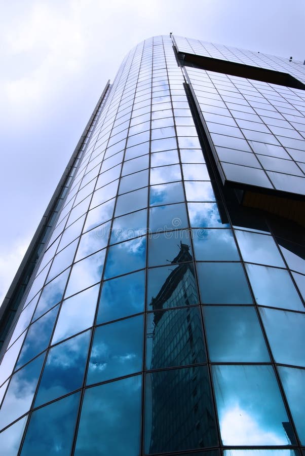 Modern architecture with reflection of an other building and sky. Window color reflection background stock images, royalty-free photos and pictures