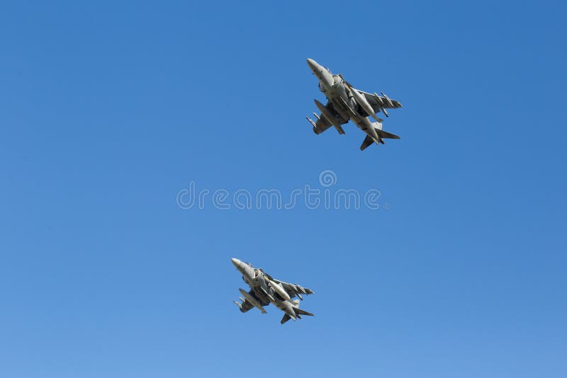 Modern Armed Military Fighter Jets Flys in Formation through the Sky ...