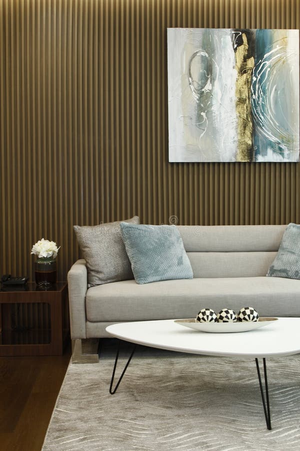 Modern Asian Living Room with Vertical Wallpaper and Gray Sofa Stock