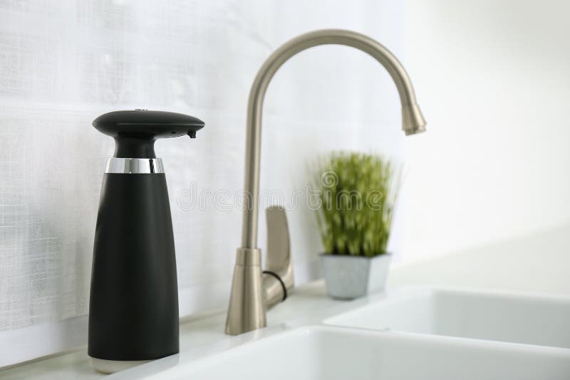 Automatic Soap Dispenser Near Sink in Kitchen Stock Image Image of