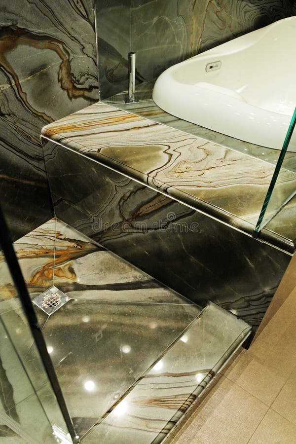 Modern Bathroom with Green Granite Walls. Stock Photo Image of