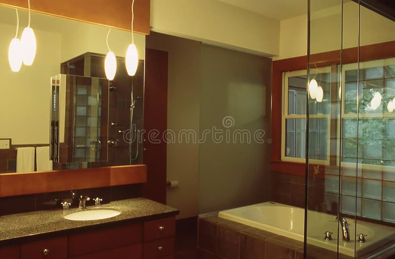 Modern Bathroom Interior with Hanging Pendant Lights Stock Photo