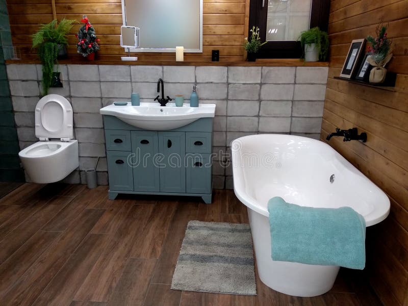 Modern Bathroom Interior with Large Bathtub. Wood and Tile Finishes