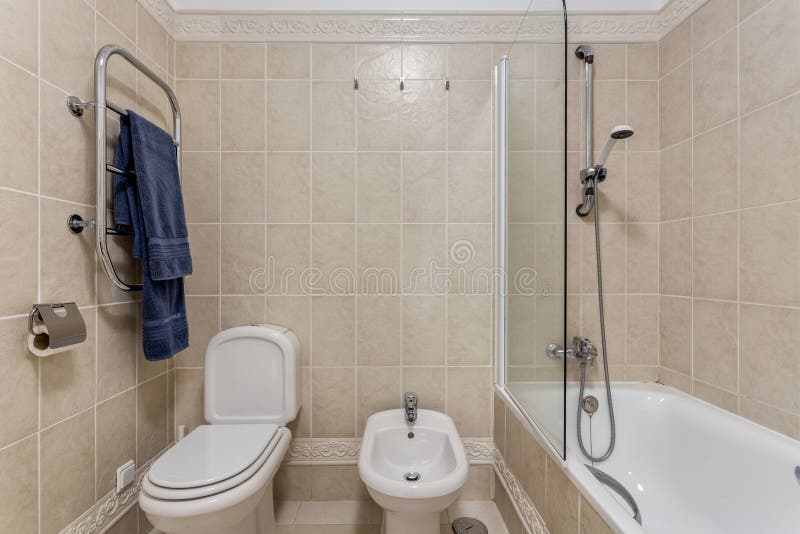 Modern Bathroom Shower Room with Toilet and Amenities. Stock Image