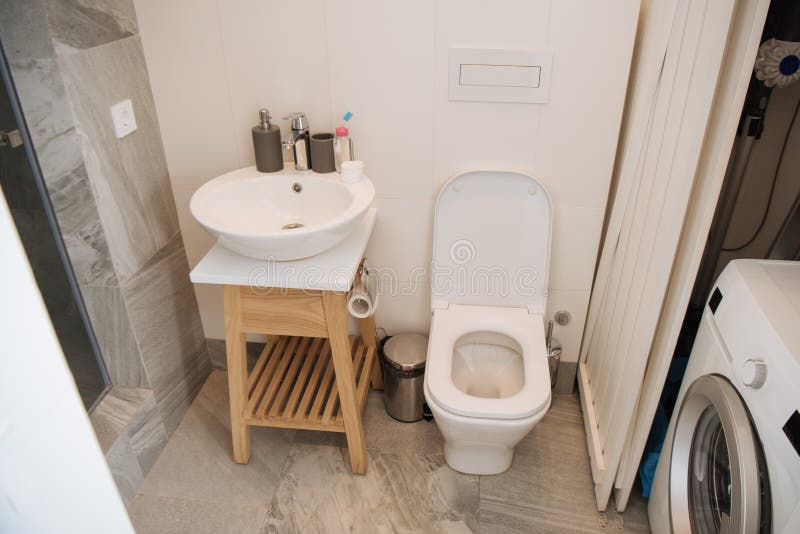 Toilet with Washbasin in the Bathroom Stock Image - Image of hygiene ...