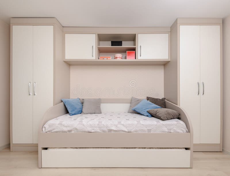 Modern Bedroom with White Wardrobe and Double Bed Stock Photo Image