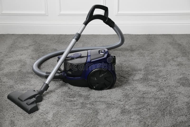 Modern Black Vacuum Cleaner on Carpet Indoors Stock Photo Image of