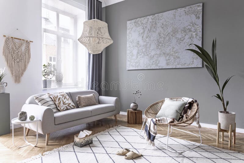 Boho interior design of living room with rattan armchair.