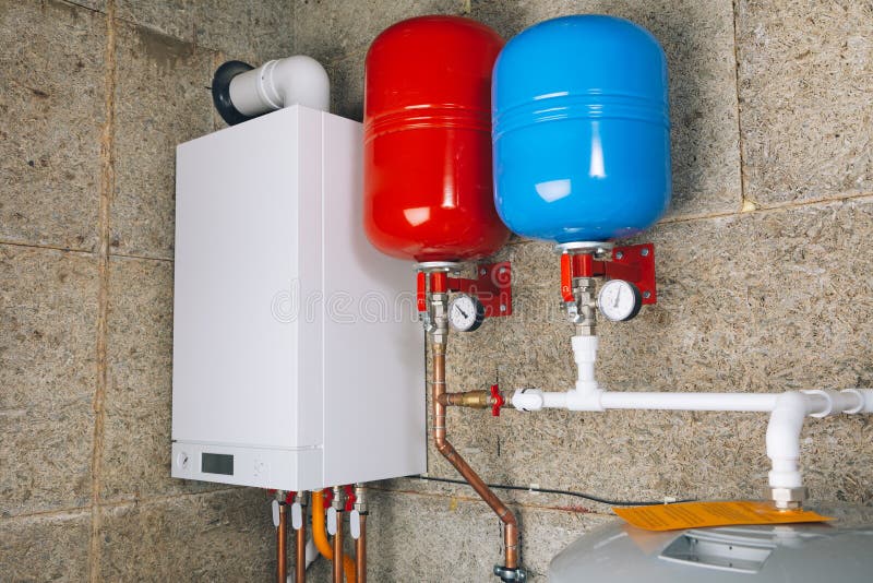 Modern boiler room independent heating system stock images