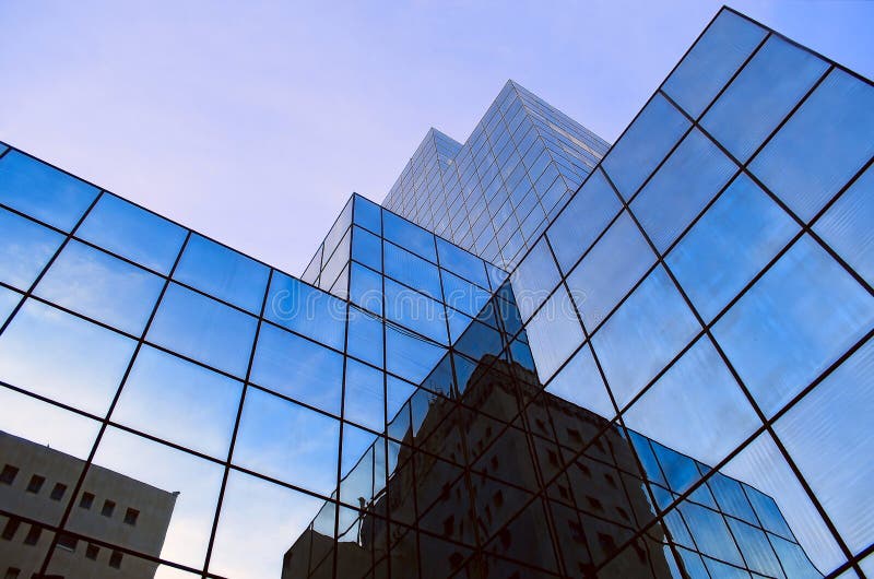 The modern building of the shopping center and offices in the city of Haifa in Israel against the sky