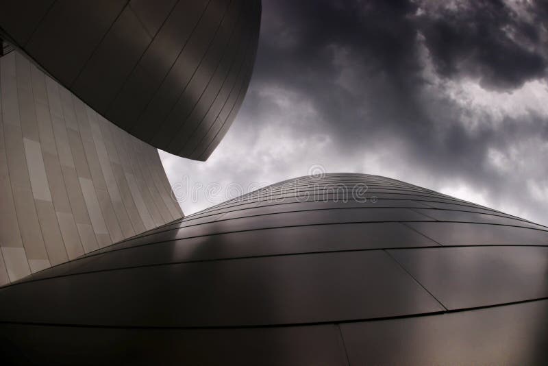 Modern building with cloudy sky