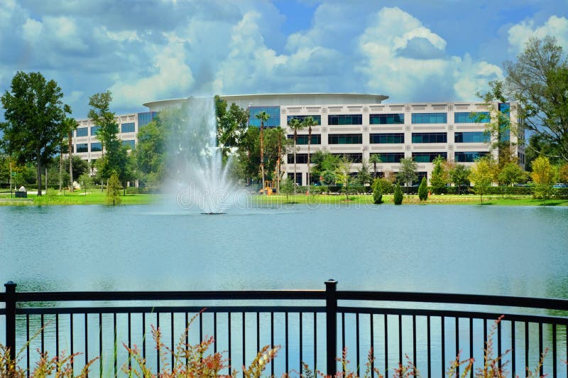 Modern Building with fountain and fence