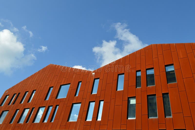 Modern building incorporating red slabs