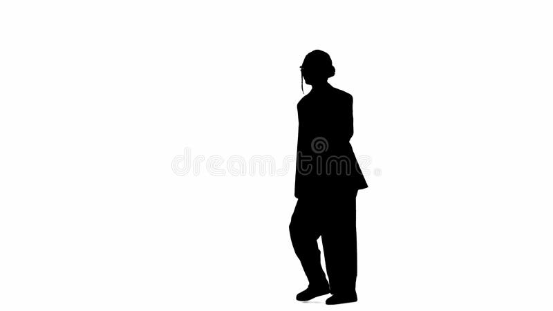 Business woman in formal outfit walking and dancing. Half-turn. Black silhouette on a white isolated background.