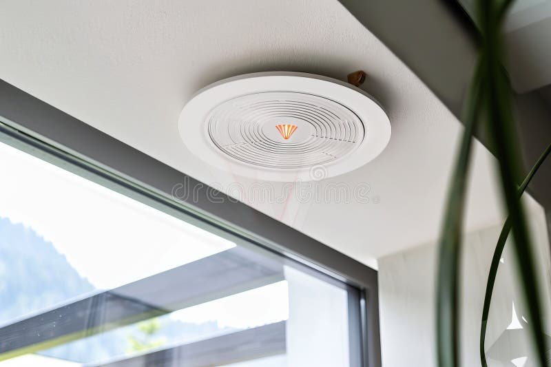 Beautiful view of Textured Apartment Ceiling With Modern Lighting And Large Windows