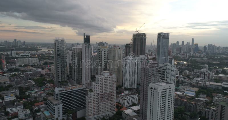 Modern city during beautiful cloudy sunset