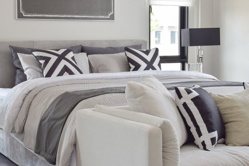 Modern classic style bedding with comfortable sofa in the bedroom stock images Modern classic style bedding with comfortable sofa in the bedroom stock images