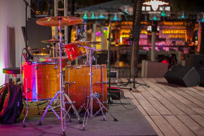 Modern Concert Stage with Musical Instruments, Bright Neon Lights Stock
