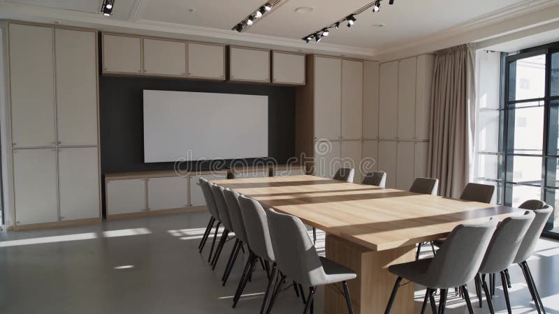 Modern conference room with empty screen and table vector illustration