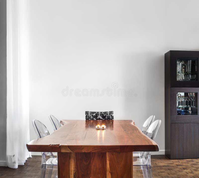 Modern and Contemporary dining room table and decorations with blank wall for your text, image or logo. Modern and Contemporary dining room table and decorations with blank wall for your text, image or logo.