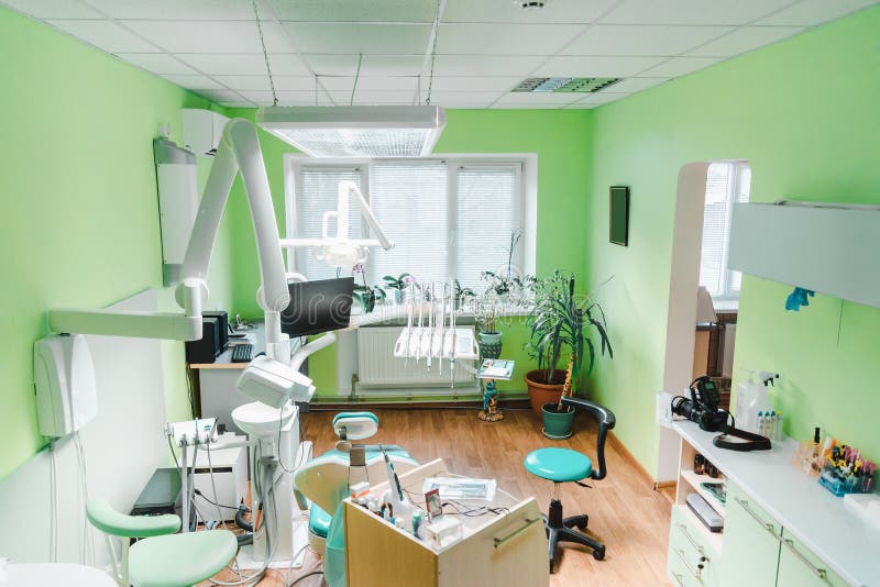 Modern Dental Office with Green Walls and Dental Equipment Stock Photo Image of instrument