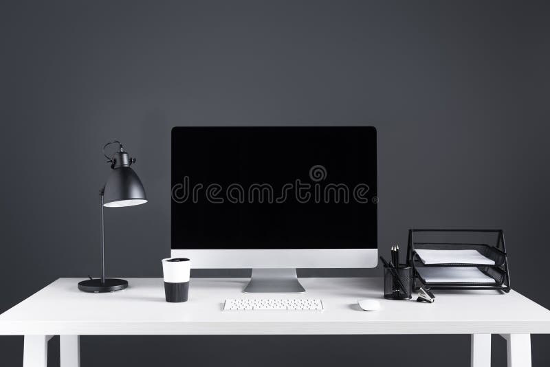 Modern desktop computer with blank screen with keyboard and computer mouse royalty free stock photography