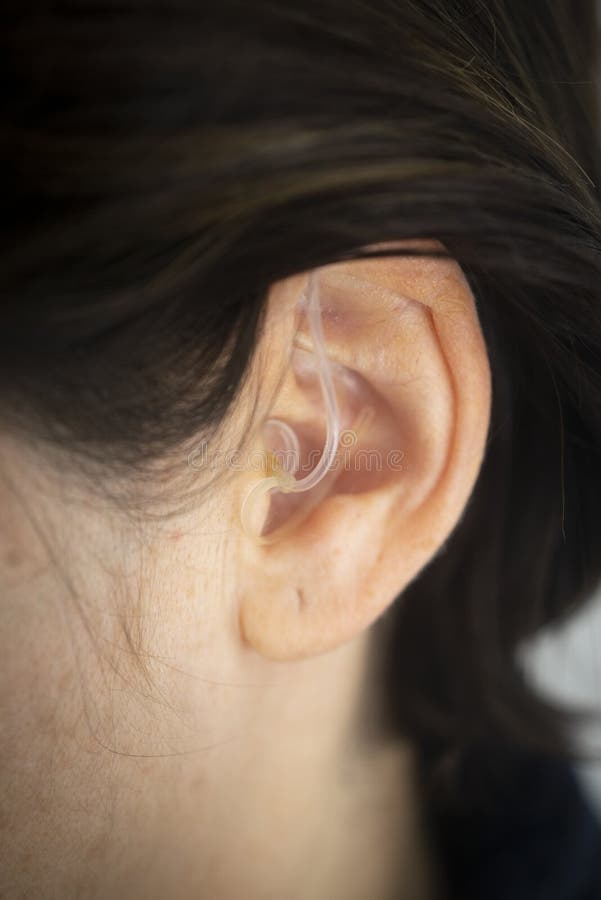 Hearing aid ear of woman stock photo. Image of closeup 230985486
