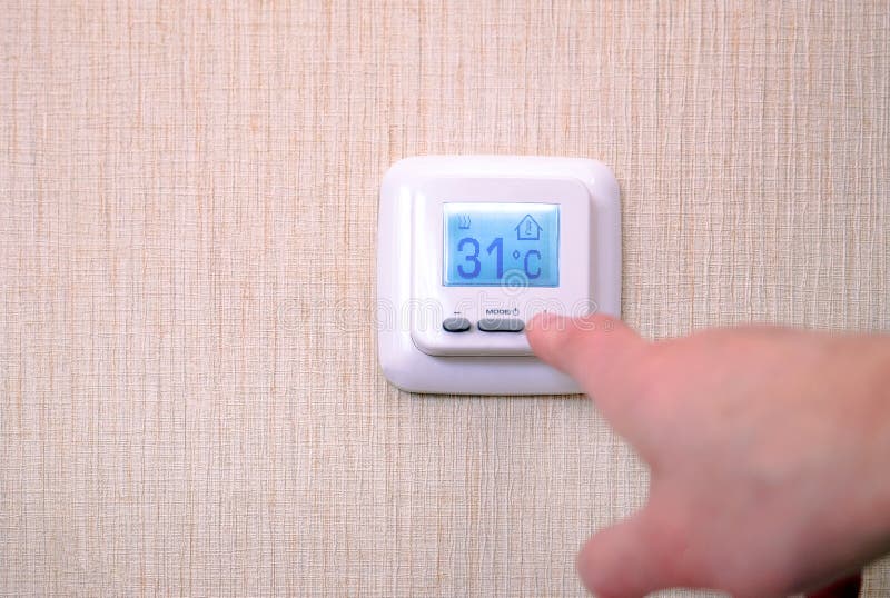 Old Programmable Thermostat for Setting the Room Temperature Stock