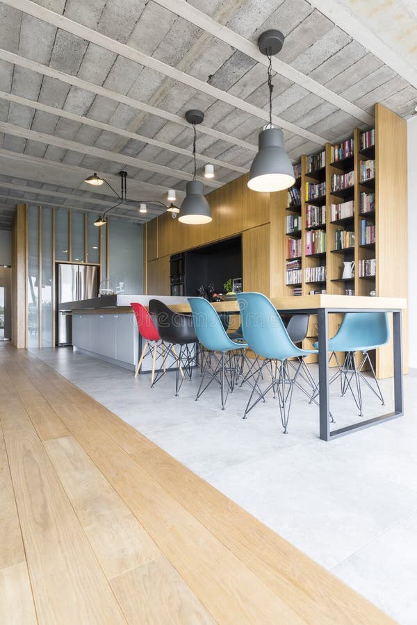 Modern dining room with colourful chairs